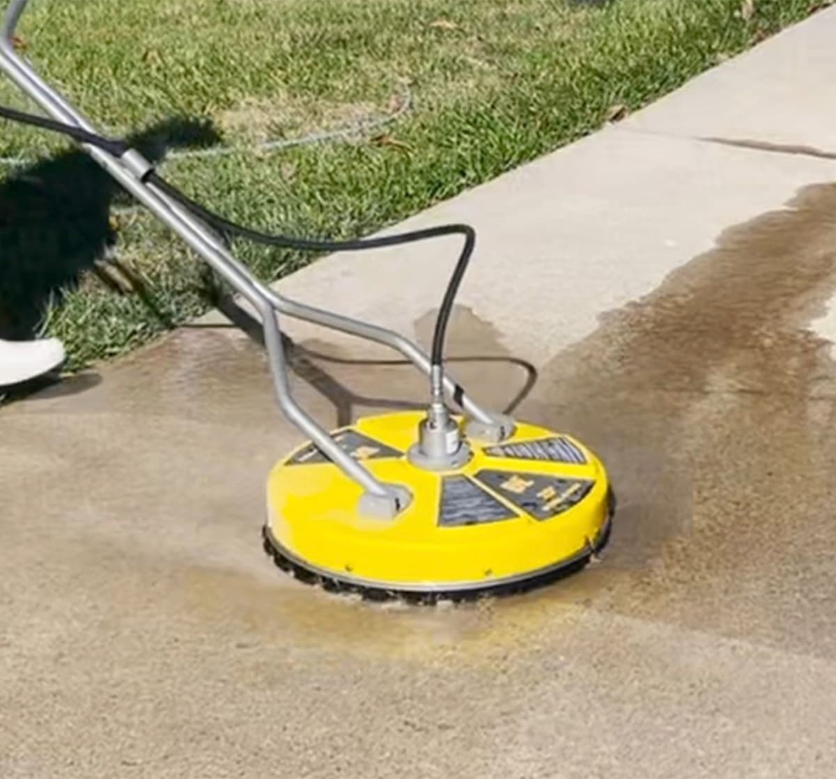 Surface cleaner attachment restoring a concrete sidewalk